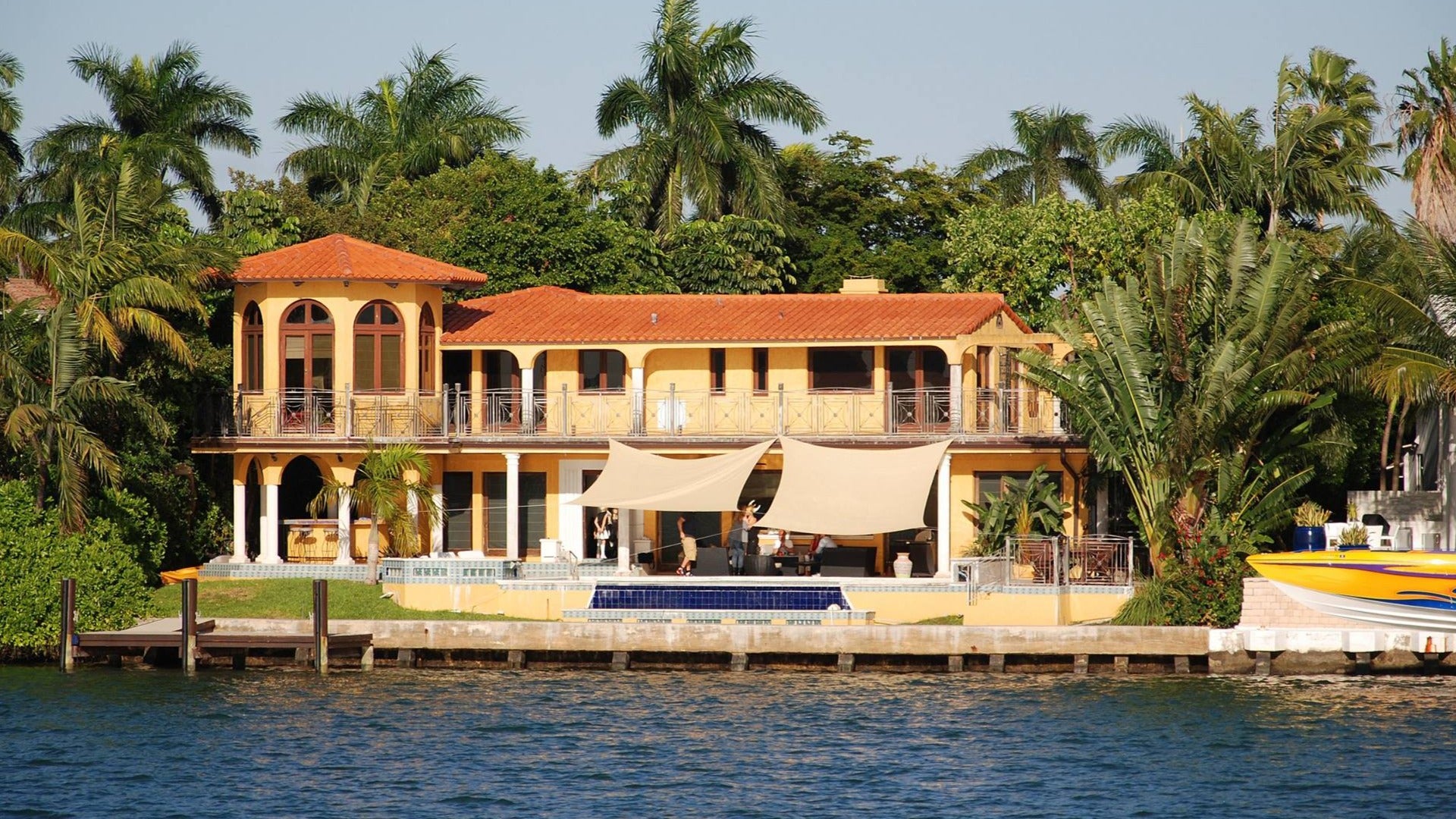 celebrity home beside a lake
